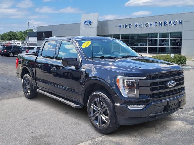 2023 Ford F-150 Lariat in Agate Black Metallic — front three-quarter view