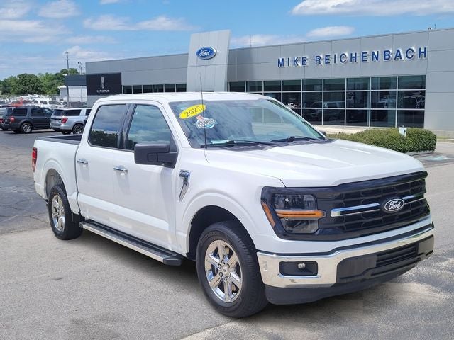 2025 Ford F-150 XLT in Oxford White — front three-quarter view