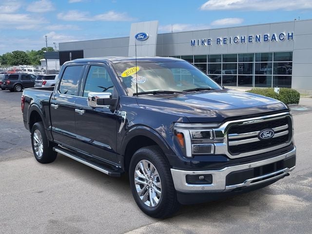 2025 Ford F-150 Lariat in Blue Metallic — front three-quarter view