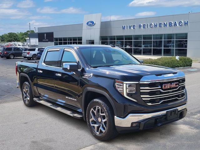 2024 GMC Sierra 1500 SLT in Onyx Black — front three-quarter view